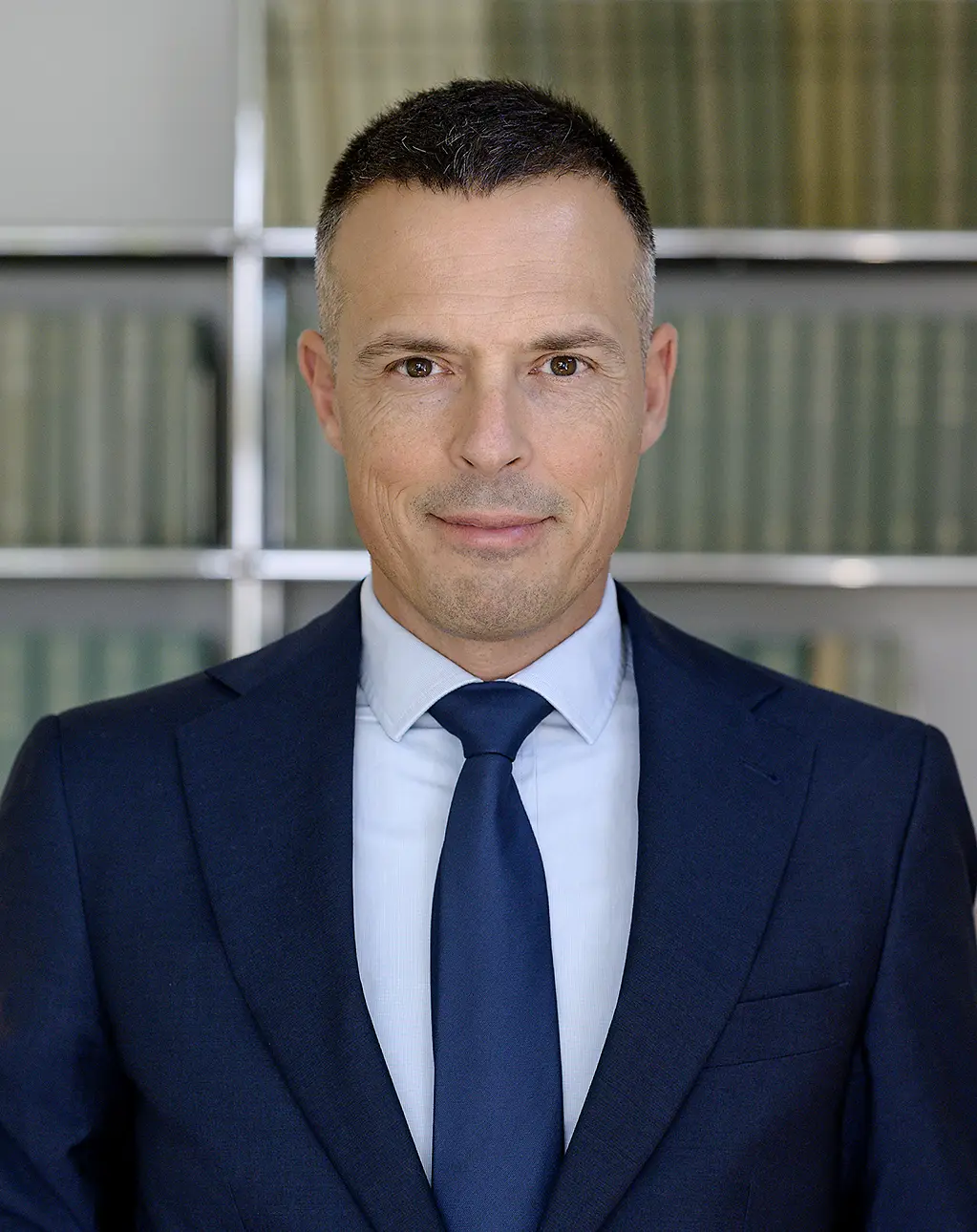 Dr. iur. Kenad Melunovic Marini